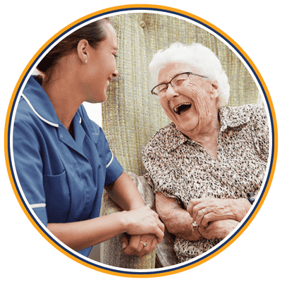 Support worker sharing a laugh with an elderly client